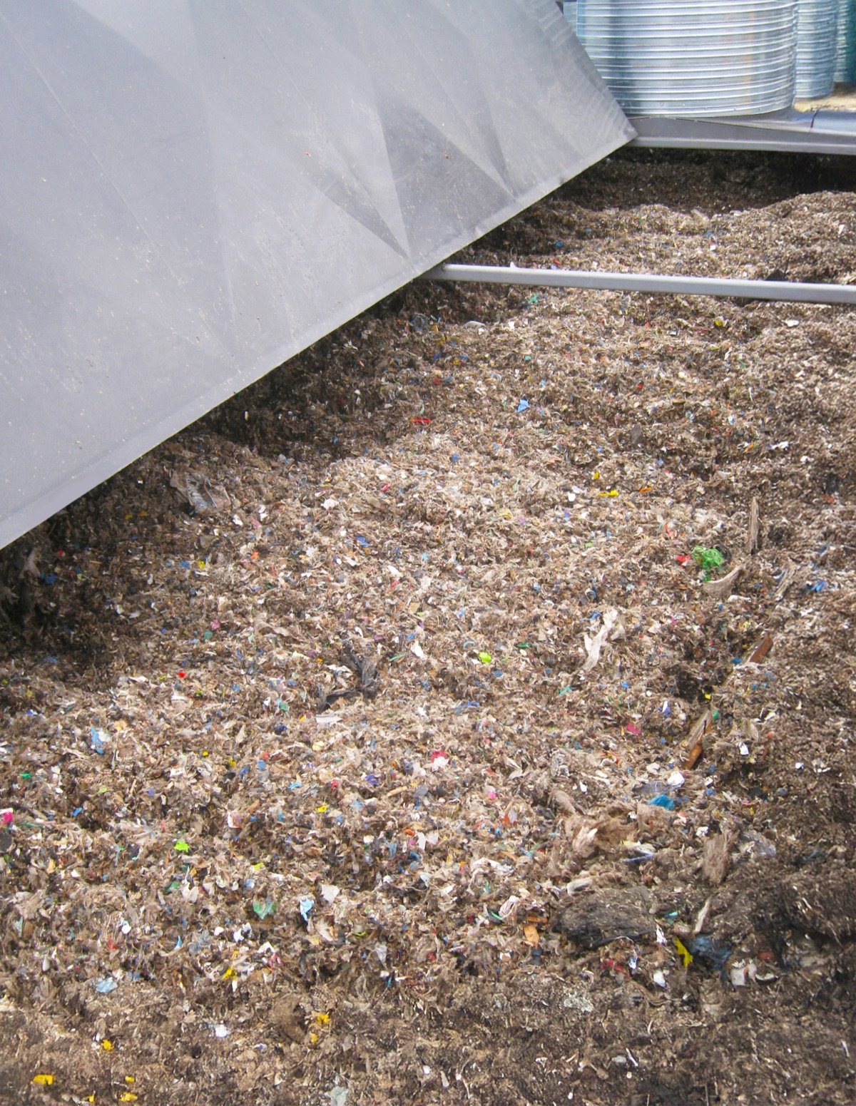 Shredded RDF material being processed through FlowDrya drying system
